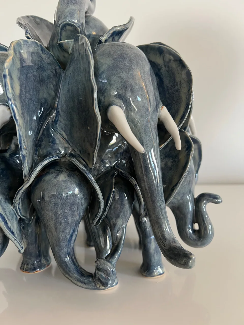 Grey blue herd with baby elephants
