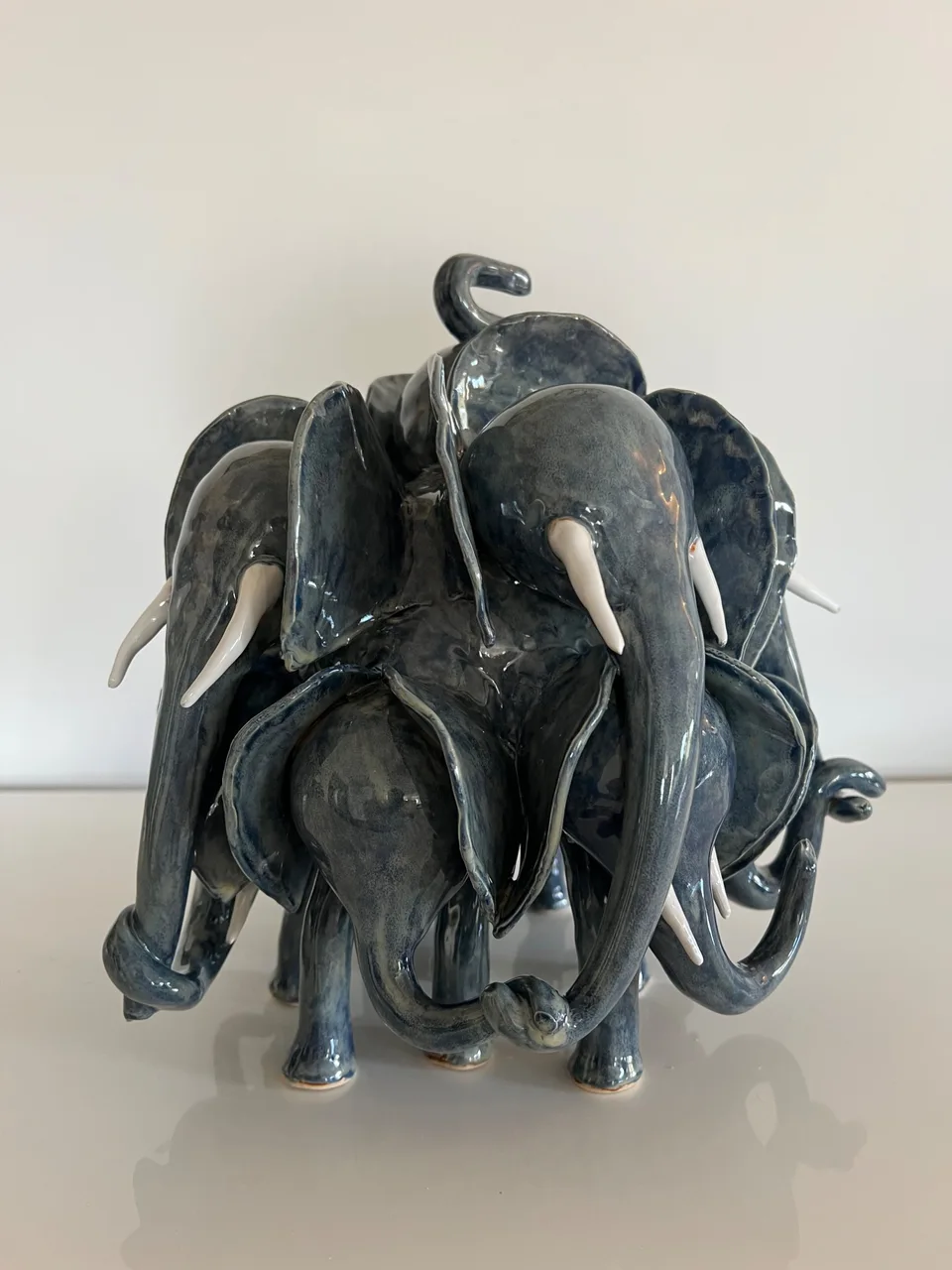 Grey blue herd with baby elephants