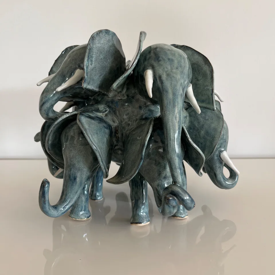 Light teal herd with mother and babies