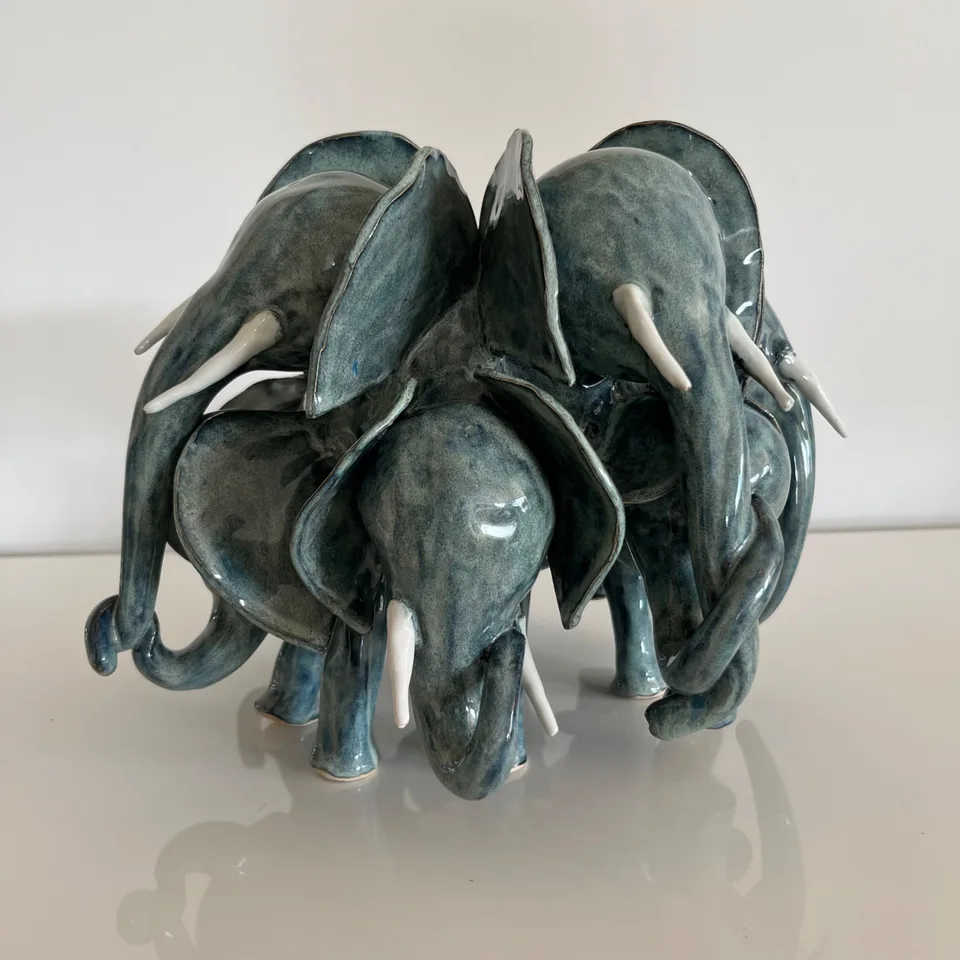 Light teal herd with mother and babies